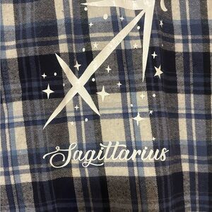 One of a Kind Woolrich flannel with Sagittarius decor on back